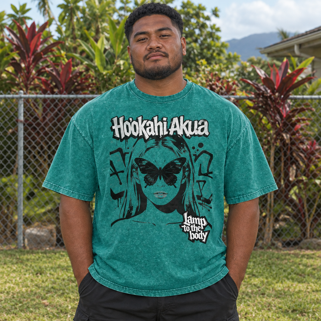 Local man in teal Lamp to the Body tee